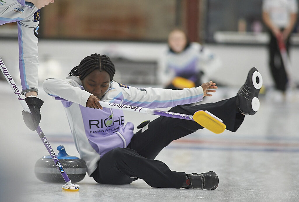 Sitaya Penny of the Cailey Locke team provided the spills and chills at this weeks Super League of Curling. Photo by Greg Locke